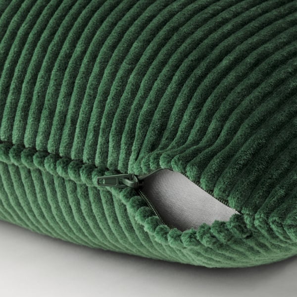 Green corduroy cushion with a zip and plush interior.