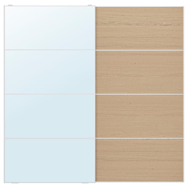 Modern two-tone closet doors featuring mirrored left panel, light wood right panel, aluminum framed, sleek design.