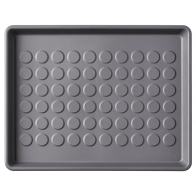 Grey rectangular BAGGMUCK mat, perforated circles, high edges, recycled polypropylene.