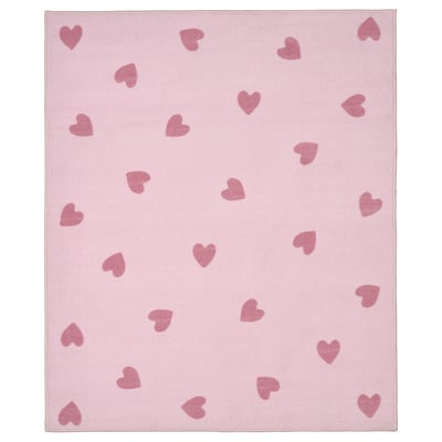 Light pink rug with small hearts, soft, made from recycled polyester.