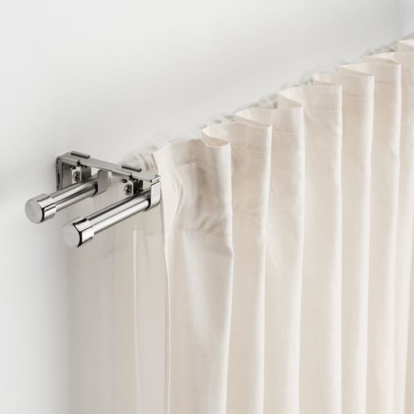 Part of BEKRÄFTA curtain rod set, wall-mounted bracket holds multiple rods, adjustable, stainless steel finish, supports multiple curtains.