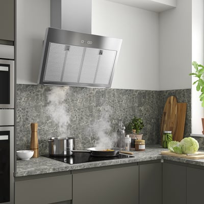Stainless steel BEMÖTA range hood with led light, ventilating and illuminating stovetop.