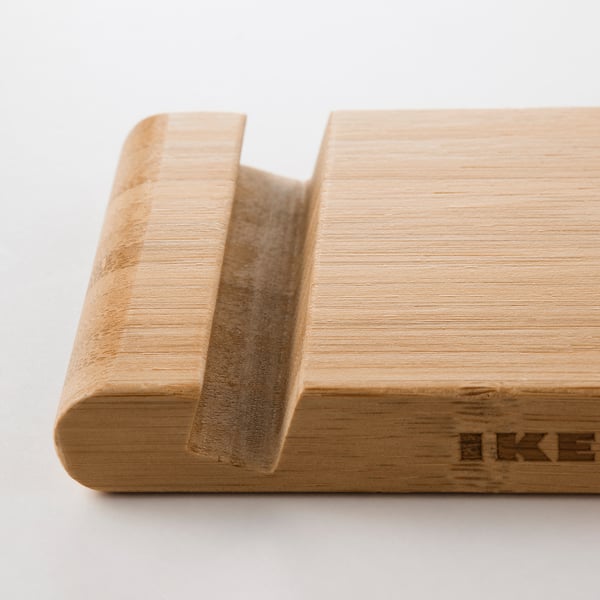 Lightweight bamboo phone stand, natural wood finish, two slot sizes for various devices.