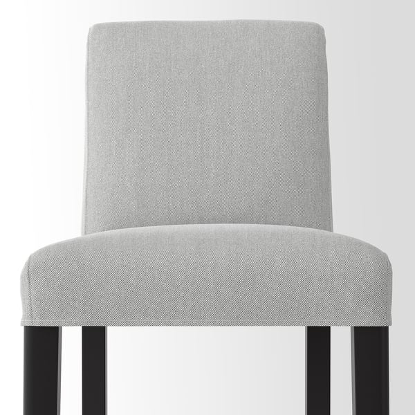 A modern grey fabric barstool with black wooden legs, designed for comfort and style.