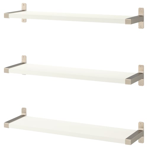 White wall shelves with nickel brackets, minimalist design.