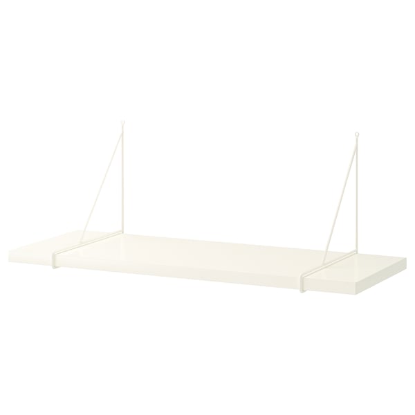 White wall shelf with angled metal brackets.