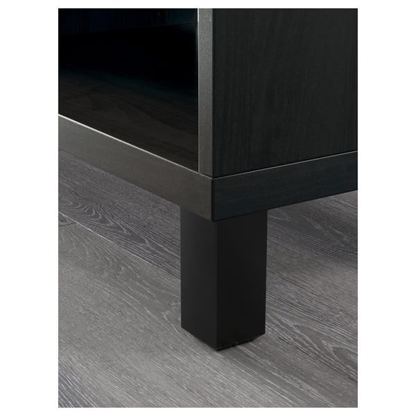 Dark wooden furniture with sleek, adjustable shelf, sturdy leg support. High-quality finish, modern design.