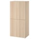 A light-colored wooden cabinet, part of the BESTÅ series, featuring two closed doors and a sleek rectangular design.