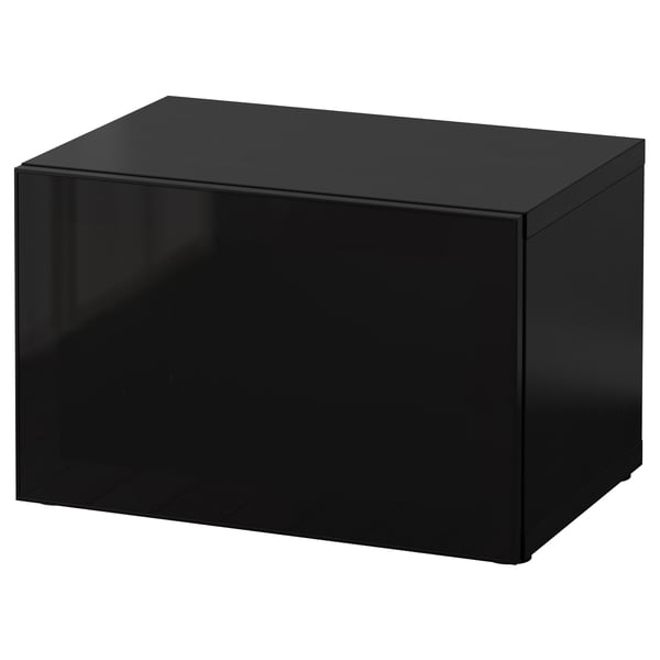 Black glossy cube-shaped storage unit, modern design, no handles, minimalist.