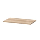 An ikea BESTÅ wooden shelf, light brown, rectangular, flat, and simple in design.