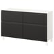 A white and black BESTÅ sideboard with two sections and adjustable shelves.