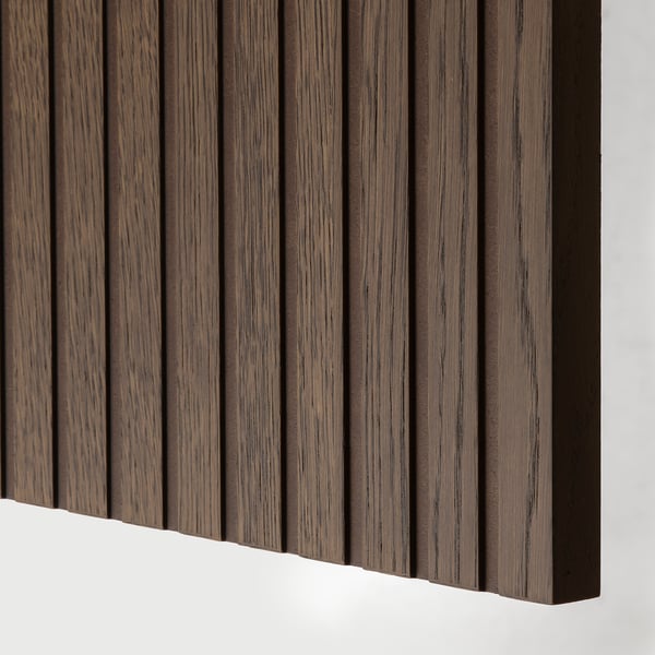 Close-up of BESTÅ units oak-veneer finish, showing natural wood grain texture and quality craftsmanship.