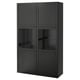 Black BESTÅ cabinet with glass doors and dark interior, modern and sleek design.