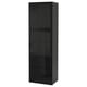 Modern black IKEA BESTÅ cabinet with glass doors & drawers for storage and display.