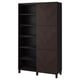 Black BESTÅ cabinet with dark wood doors, adjustable shelves, and herringbone design.