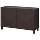 Dark brown wooden cabinet with chevron pattern, rectangular shape, two doors, and adjustable shelves.