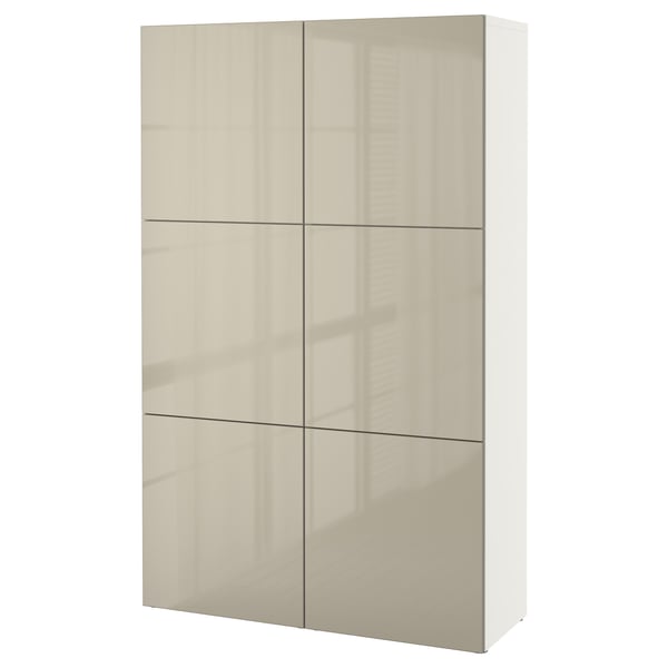 A white BESTÅ shelf unit with six beige reflective doors. The modern design adjustable shelves and hinges for customization.