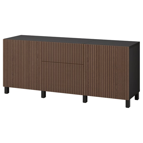 Ikea BESTÅ sideboard: dark brown wood grain with black legs, rectangular shape, four doors, two drawers.
