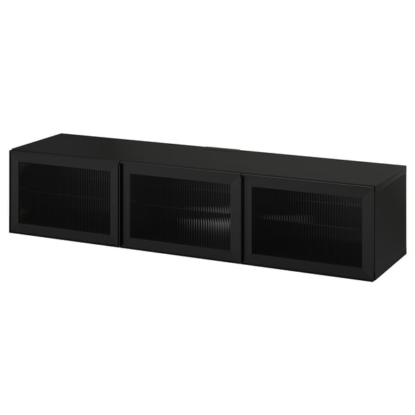 Black BESTÅ tv bench, rectangular with glass doors, sleek design, storage & cable management.
