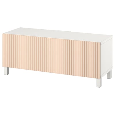 Modern white tv bench with light wooden fluted doors, four metal legs, and adjustable shelves.