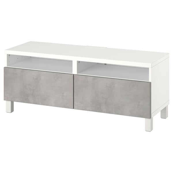 A white tv stand with concrete-effect design, two shelves, and two smooth-close drawers for storage.