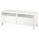 A white BESTÅ tv stand with two drawers and open shelves for cable management and storage.