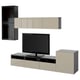 Modern entertainment unit: black & beige BESTÅ, includes tv stand, wall cabinets, & drawers. Sleek, rectangular design with glass & metal accents.