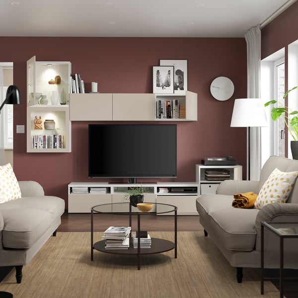 Modern living room with a BESTÅ tv storage combination. Adjustable shelves, cable management, and soft-closing drawers.