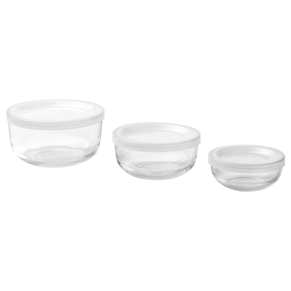 Three clear glass containers with lids, stacked in descending size, ideal for food storage and organisation.