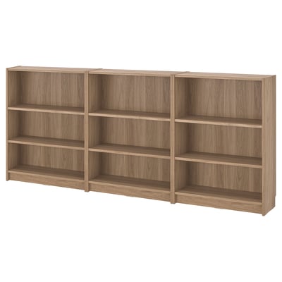 BILLY bookshelf, light brown, 3 sections, 4 shelves each, functional design.