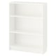 A white BILLY bookcase with three adjustable shelves. Its rectangular and made of particleboard and melamine foil.