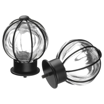 Two spherical glass finials with black metal frames and bases, styled for curtain rods.