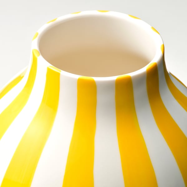 Vibrant, hand-painted vase with bold yellow stripes on white. Round shape, narrow opening, smashed glaze, displaying fine craftsmanship.