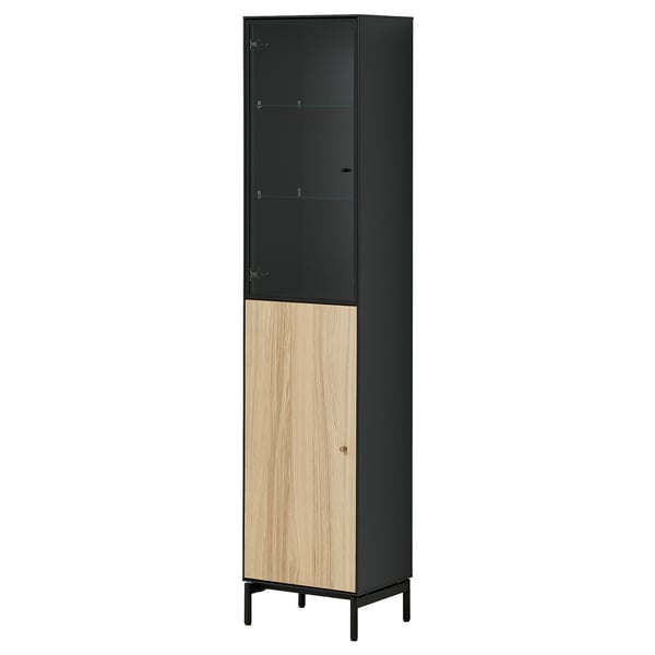 BOASTAD: tall black cabinet with wooden door, glass top, adjustable feet, and sleek design.