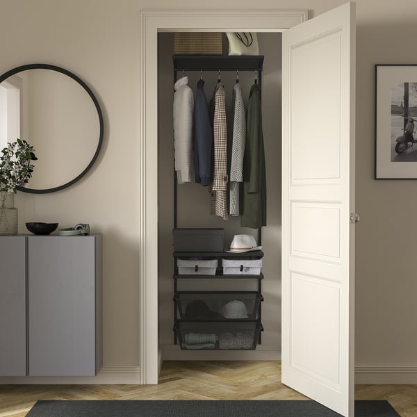 BOAXEL closet with shelves, hanging rails, and baskets for efficient storage.
