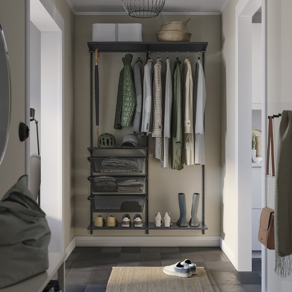 BOAXEL storage system in dark grey with clothes, accessories, and mirror.