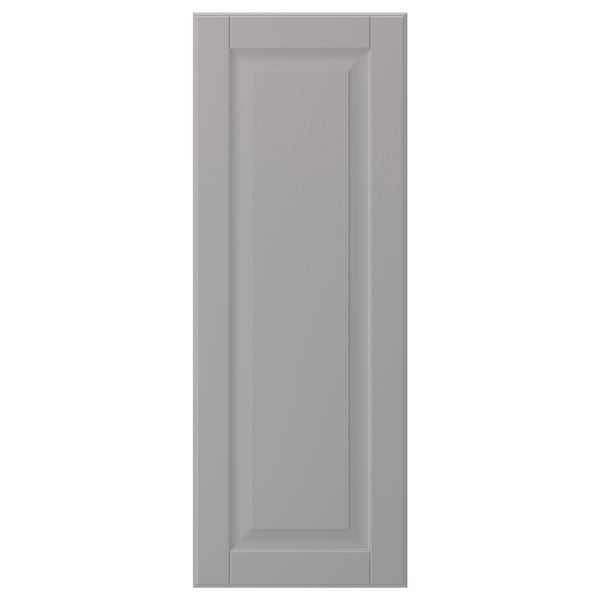 This image shows a light grey BODBYN cabinet door with a smooth, rectangular design and bevelled panels.