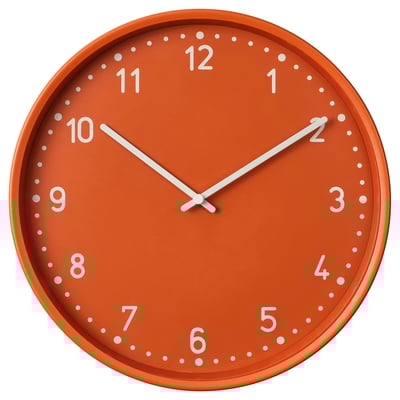 An orange silent wall clock, round shape, with white numbers and hands. Modern design, no ticking sound.
