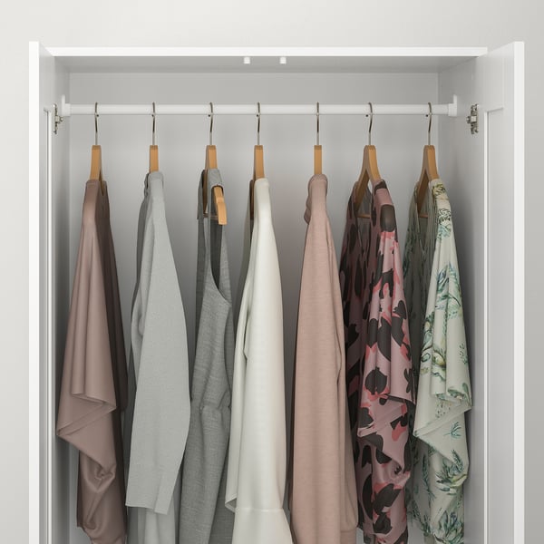 Closet with hanging clothes rail, inner shelf, and safety fitting.