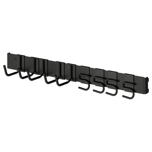 Black metal storage rail with multiple hooks for organising tools or sports equipment in a garage or storage room.