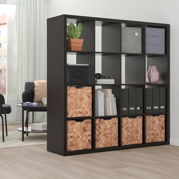 Black BULLIG bamboo storage cubes fit kallax shelves, perfect for organising items in a living room.