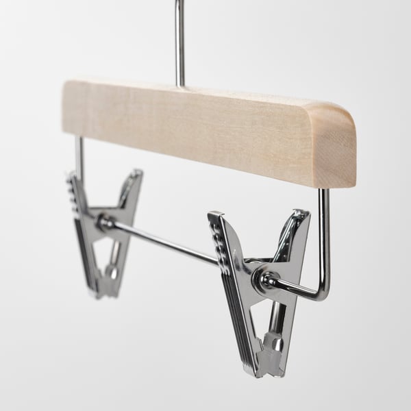 Wooden skirt/trouser hanger with sturdy metal clips, chrome finish, ensures clothes stay wrinkle-free.