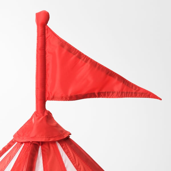 Bright red tent with peaked top and triangular flag, set against a plain white background.