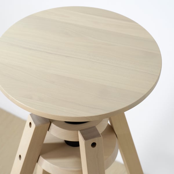Adjustable wooden stool, round seat, three legs. Birch wood, classic finish, easy to assemble. Home use.