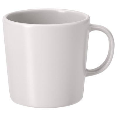 A white DINERA mug with a smooth, round shape and simple design, made from stoneware.