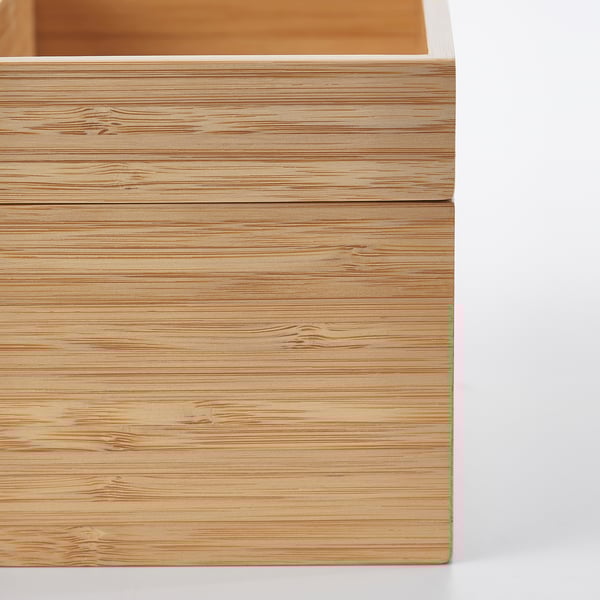 Close-up of natural bamboo storage box with smooth, even grain texture.