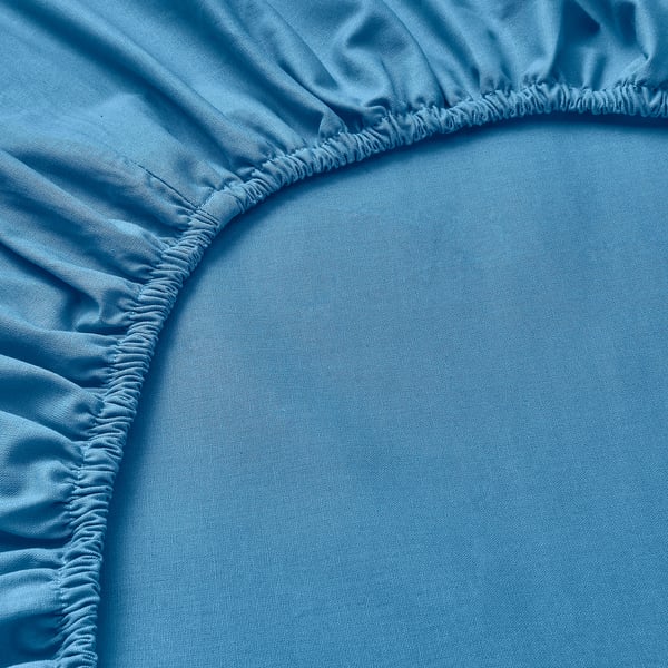 DVALA fitted sheet, made of soft, natural 100% cotton with elastic edges for a secure fit.