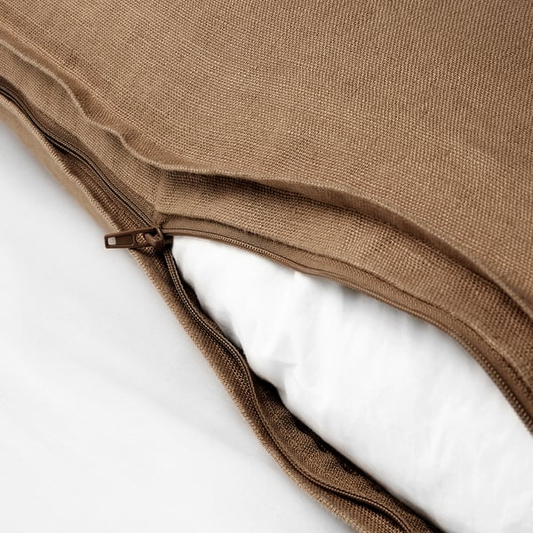 Hidden zip on linen cushion cover, easy to remove for washing.