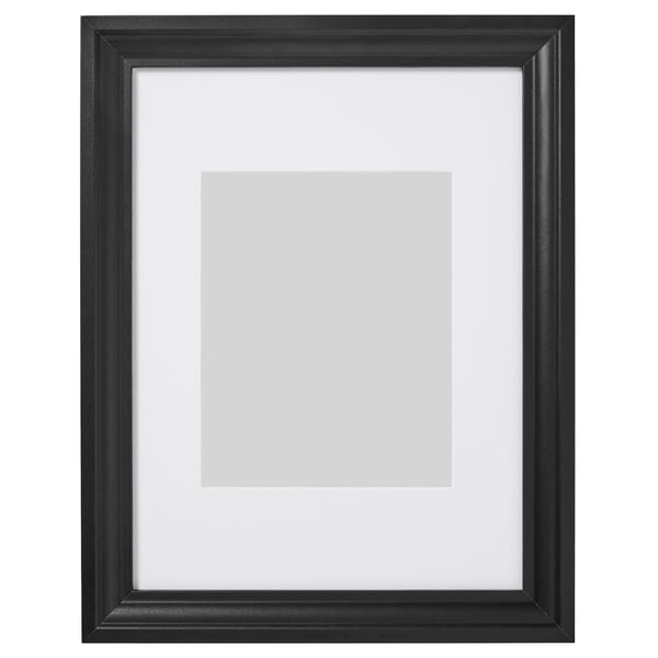 Black picture frame, rectangular shape, simple design with white mat.
