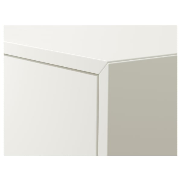 Modern white cabinet with sleek design, featuring clean lines and smooth edges. Perfect for minimalist decor.